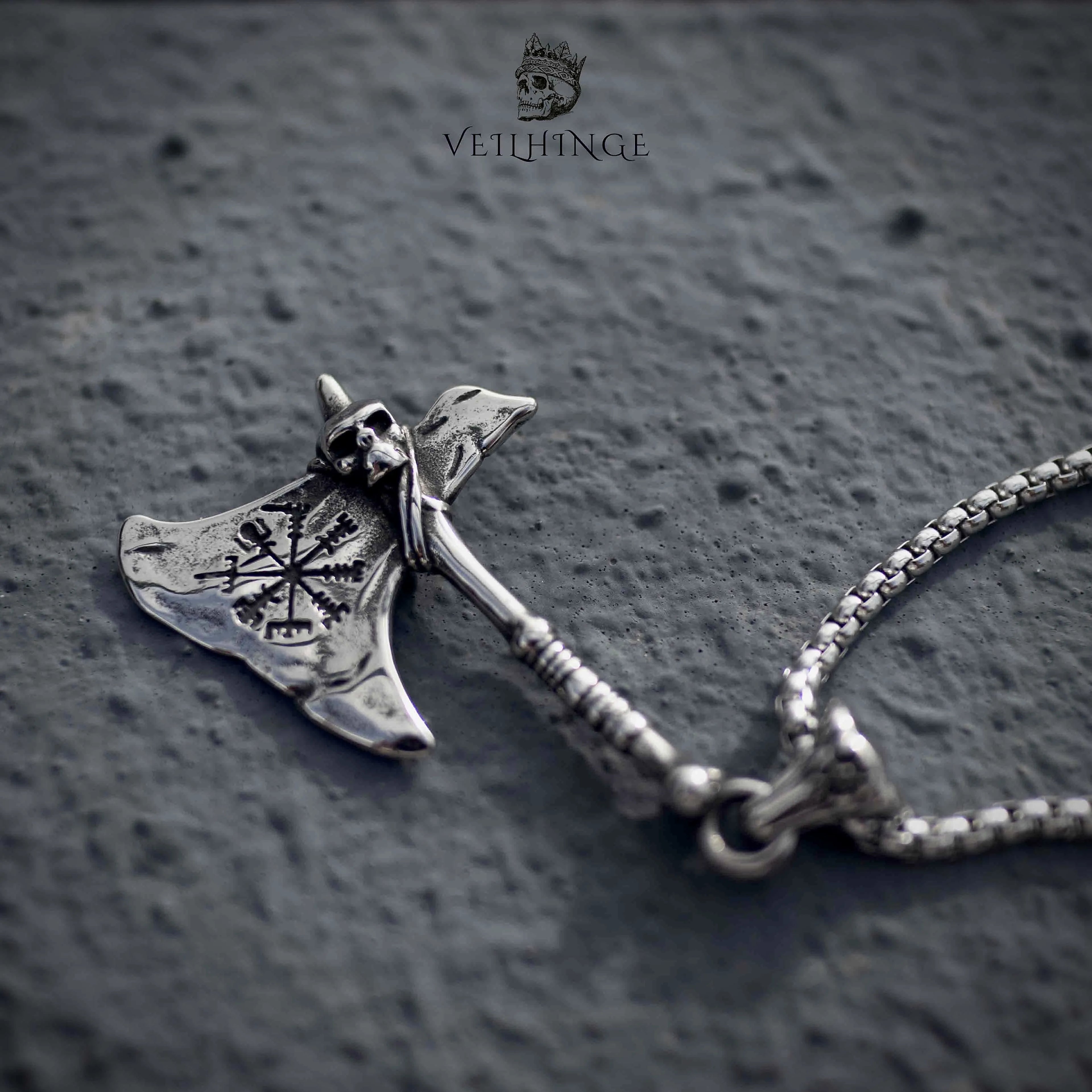 Viking battle axe pendant necklace flat lay, Celtic knotwork blade detail with box chain, oxidized silver, Norse mythology jewelry