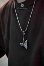 Viking battle axe pendant necklace worn on model with dark outfit, Vegvisir compass axe pendant, oxidized silver, Norse dark aesthetic statement necklace