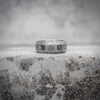 Viking rune ring with Triquetra symbol and Norse rune engraving, Celtic knot border band in polished stainless steel, dark aesthetic medieval ring by Veilhinge, front view