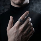 evil eye spinner ring worn on hand stainless steel band