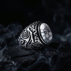dark aesthetic white stone signet ring product shot with smoke