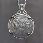 Decision coin pendant reversed to the YES side showing two raised hands, sun, crescent moon, and all-seeing eye motifs, held in a four-prong bezel on a box chain